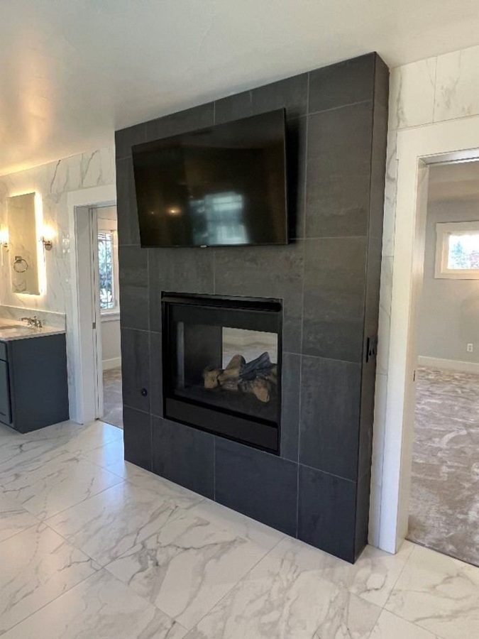 Living Room & Fireplace after renovation by Elle & Ivy Interiors