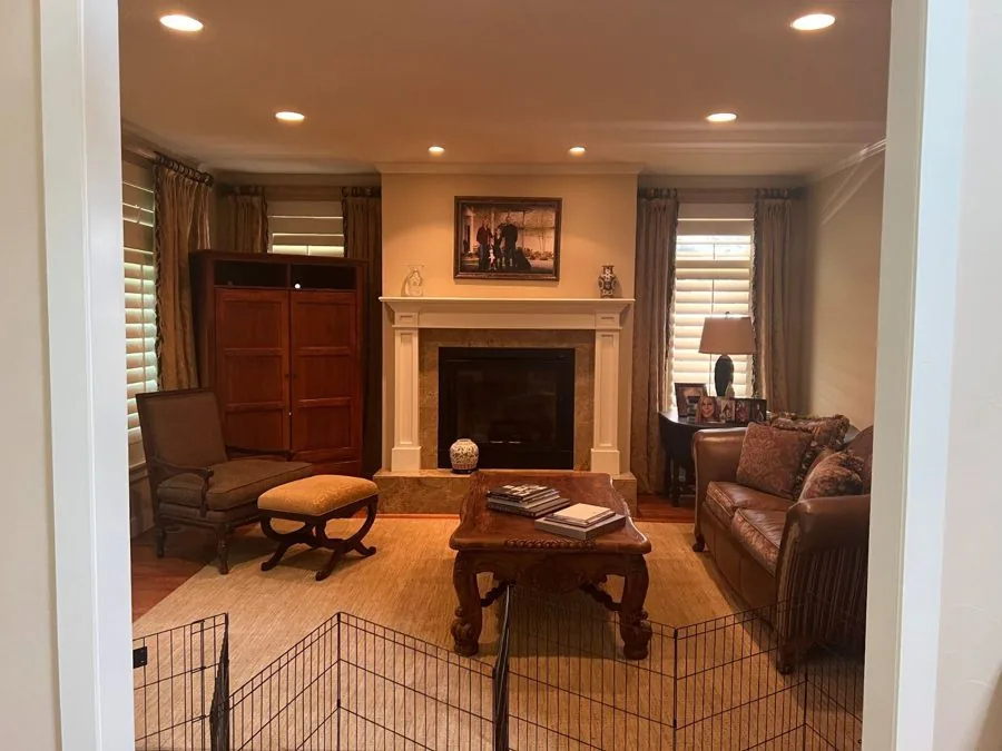 Living Room & Fireplace before renovation by Elle & Ivy Interiors